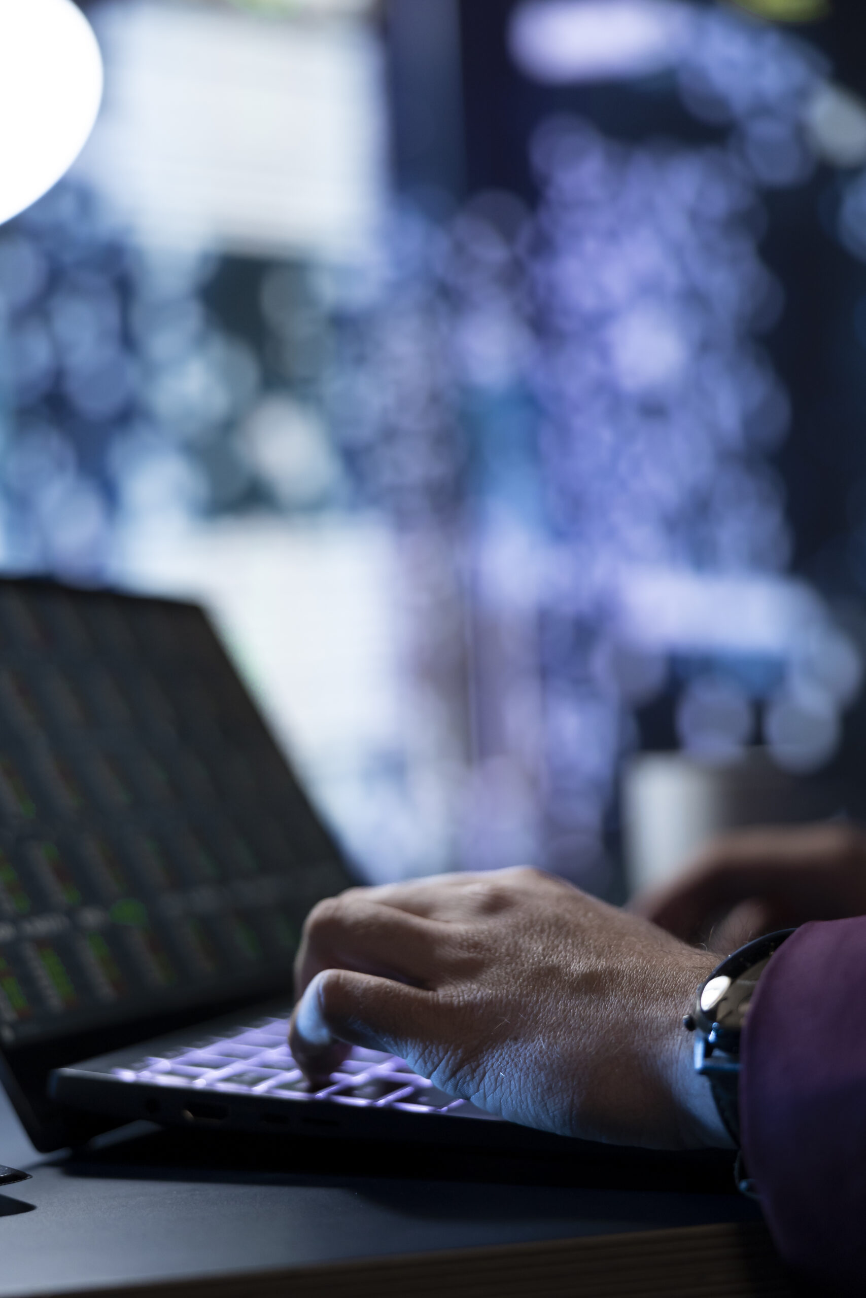 Analyst examines business records and financial resources to provide assistance to board members, working on increasing profit. Businessman investor follows stock market exchange trends. Close up.